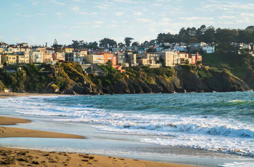 Luxury homes on cliffs extending out into San Francisco Bay Area bakers Beach Real estate